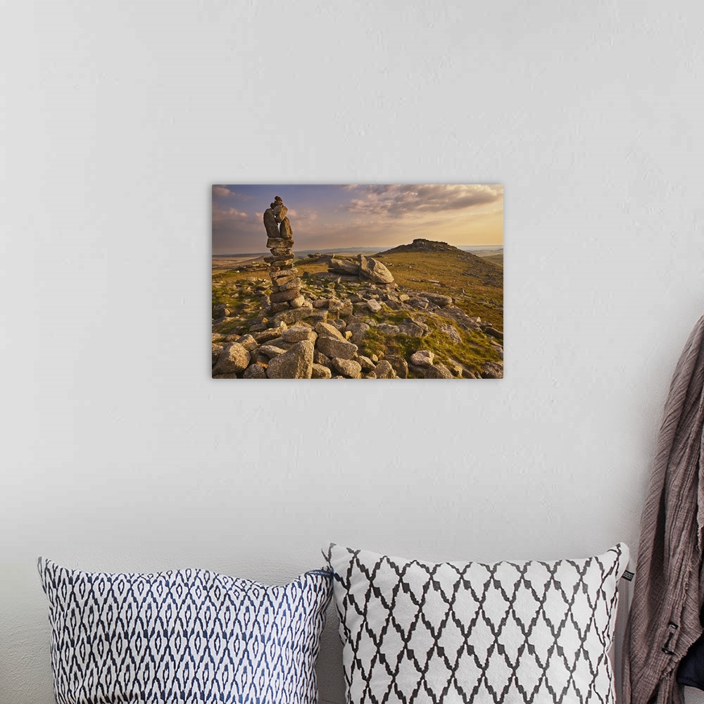 A bohemian room featuring Granite boulders on the summit of Rough Tor, one of the highest points of Bodmin Moor, lit by eve...