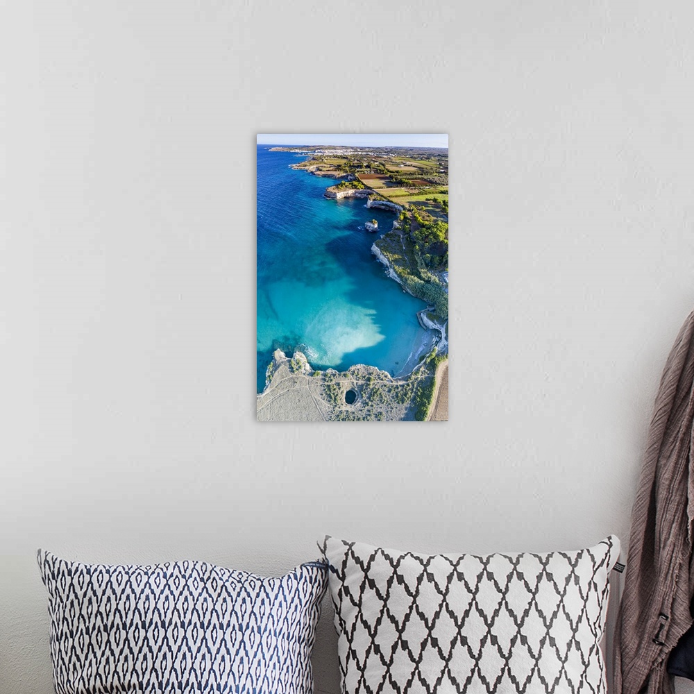 A bohemian room featuring Aerial view of the open grotto known as Grotta Sfondata on cliffs along the coastline, Otranto, L...