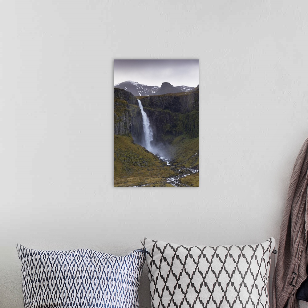 A bohemian room featuring Grundarfoss waterfall near Grundarjordur, Snaefellsnes Peninsula, Iceland