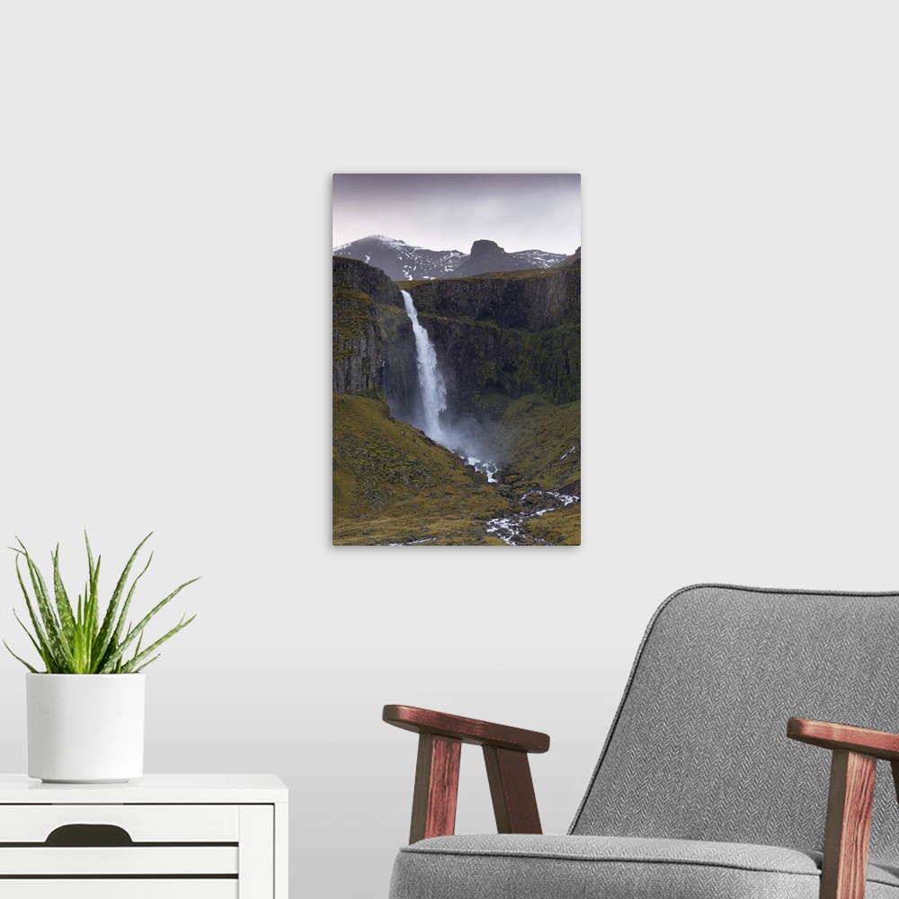 A modern room featuring Grundarfoss waterfall near Grundarjordur, Snaefellsnes Peninsula, Iceland