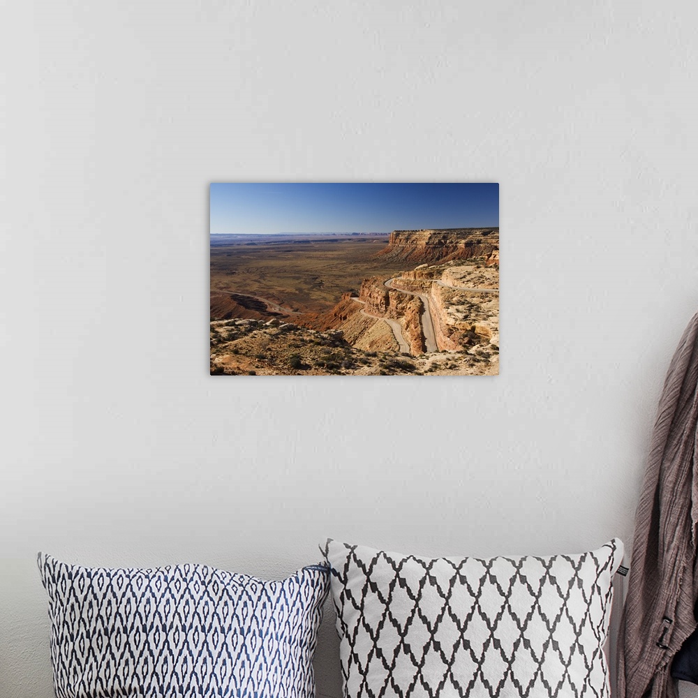 A bohemian room featuring Hairpin bends leading down to the Valley of the Gods near Monument Valley, Arizona