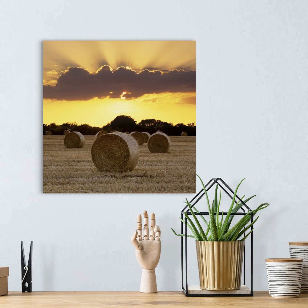 A bohemian room featuring Hay bales at sunset, East Sussex, England, UK
