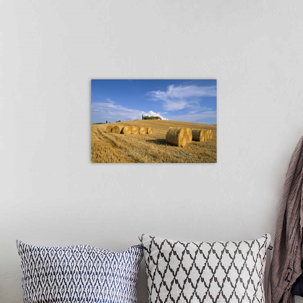 A bohemian room featuring Hay bales, Val d'Orcia, Siena province, Tuscany, Italy