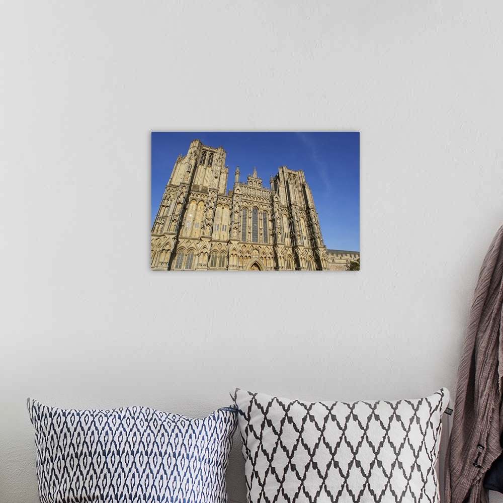 A bohemian room featuring The historic western facade of Wells Cathedral, with its twin square towers, in Wells, Somerset, ...