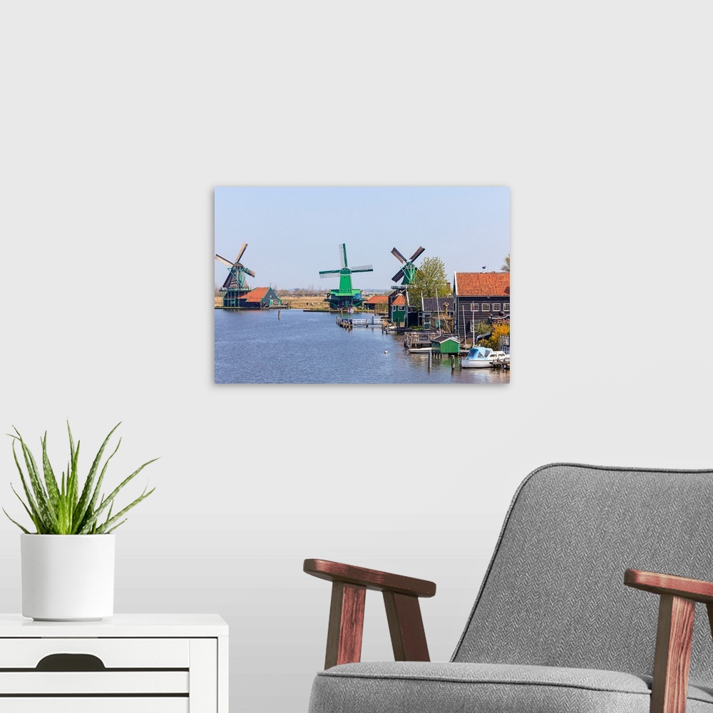 A modern room featuring Historic windmills and houses in Zaanse Schans, North Holland, Netherlands