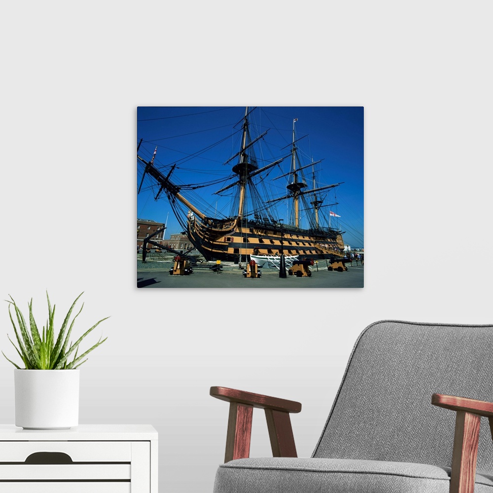 A modern room featuring HMS Victory in dock at Portsmouth, Hampshire, England