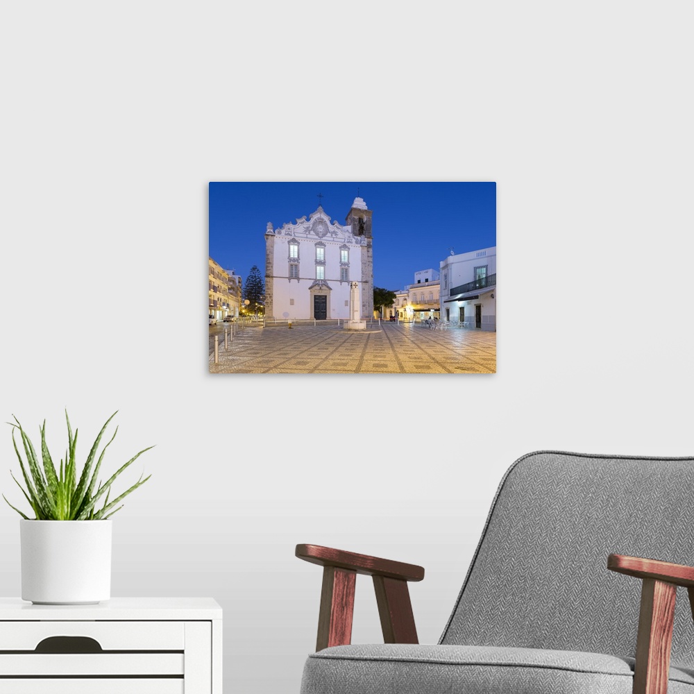 A modern room featuring Igreja Matriz parish church at night, Olhao, Algarve, Portugal