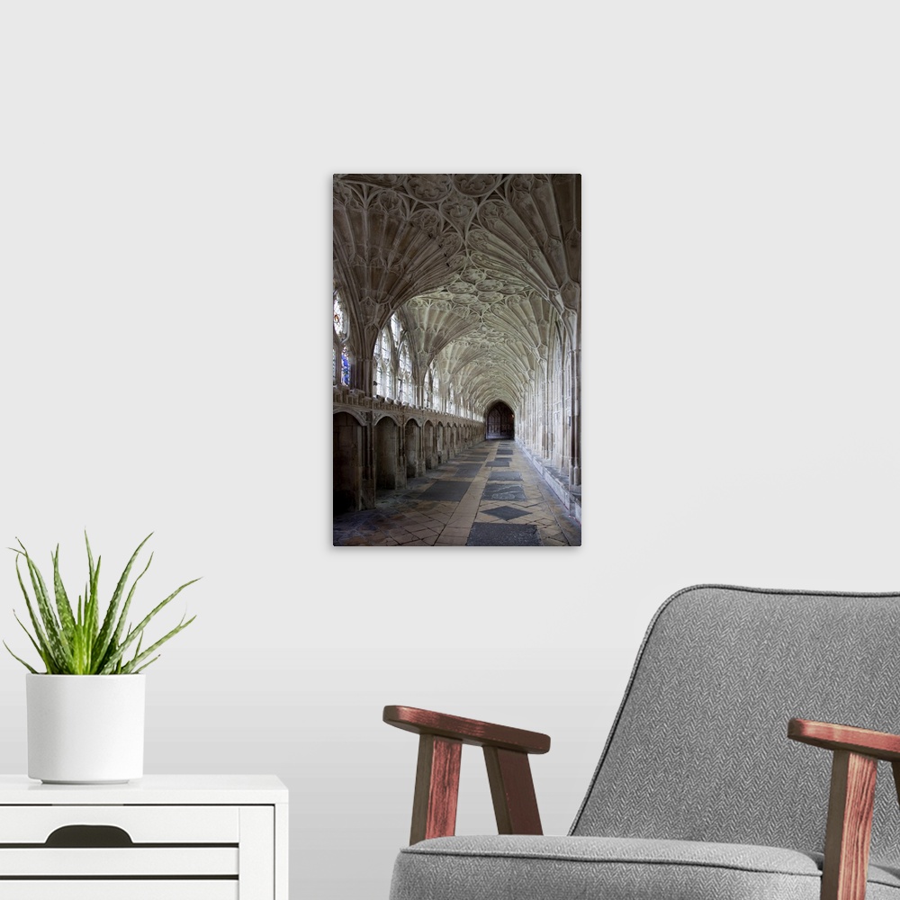 A modern room featuring Interior of cloisters with fan vaulting, Gloucestershire, England, UK
