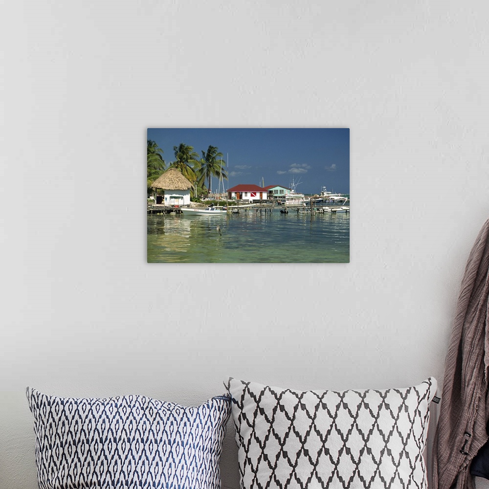 A bohemian room featuring Jetties and buildings at Ambergris Caye on Main Dive Island in Belize