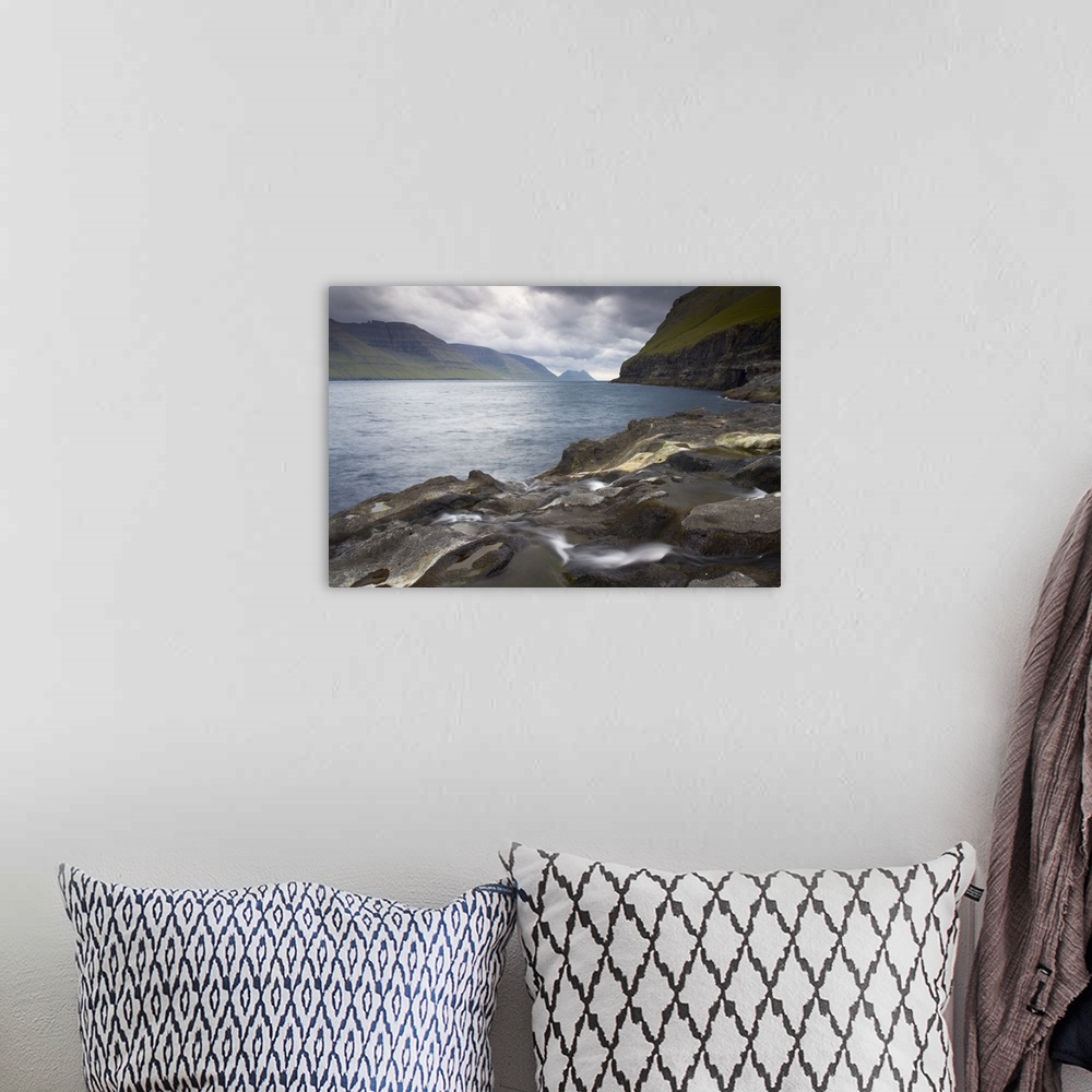 A bohemian room featuring Kalsoyarfjordur, with Kalsoy on the right, and Kunoy islands from Mikladalur on Kalsoy, Nordoyar,...
