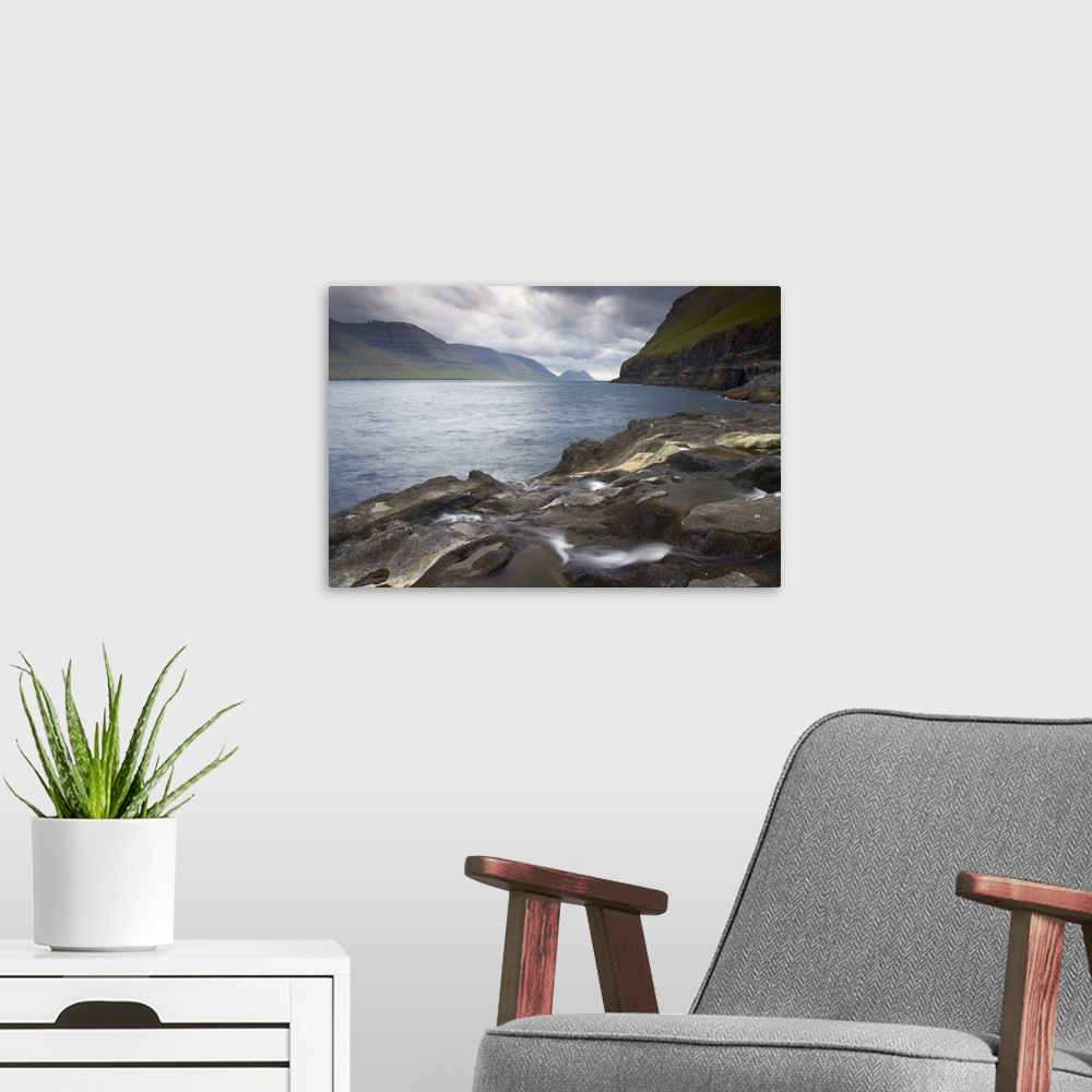 A modern room featuring Kalsoyarfjordur, with Kalsoy on the right, and Kunoy islands from Mikladalur on Kalsoy, Nordoyar,...