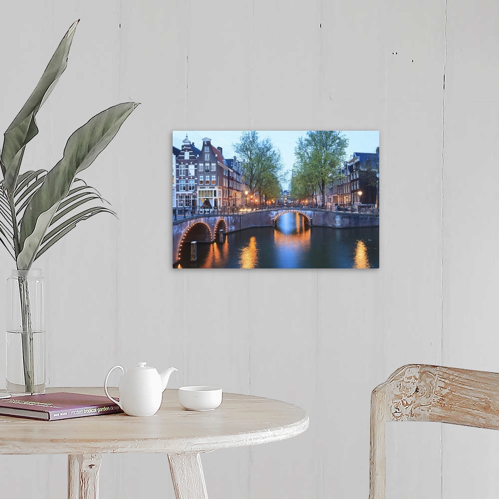 A farmhouse room featuring Keizersgracht and Leidsegracht canals at dusk, Amsterdam, Netherlands, Europe.