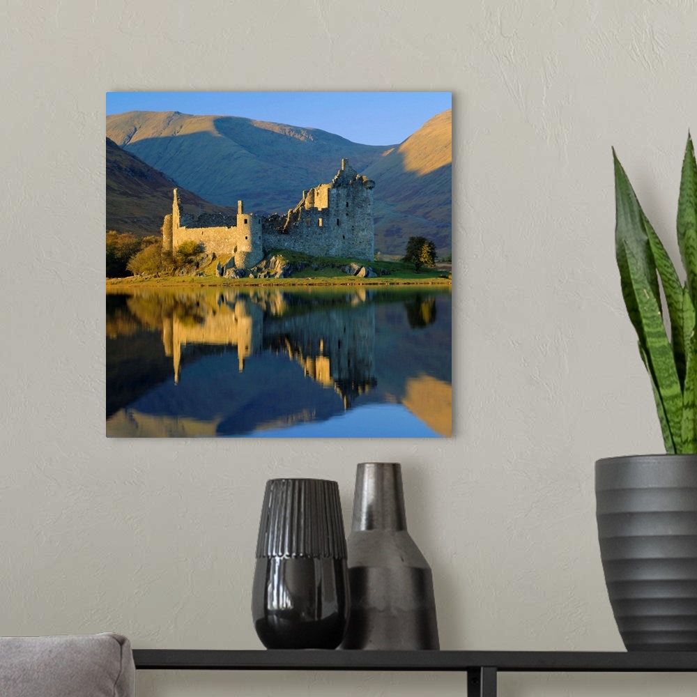 A modern room featuring Kilchurn Castle reflected in Loch Awe, Strathclyde, Scotland, UK, Europe