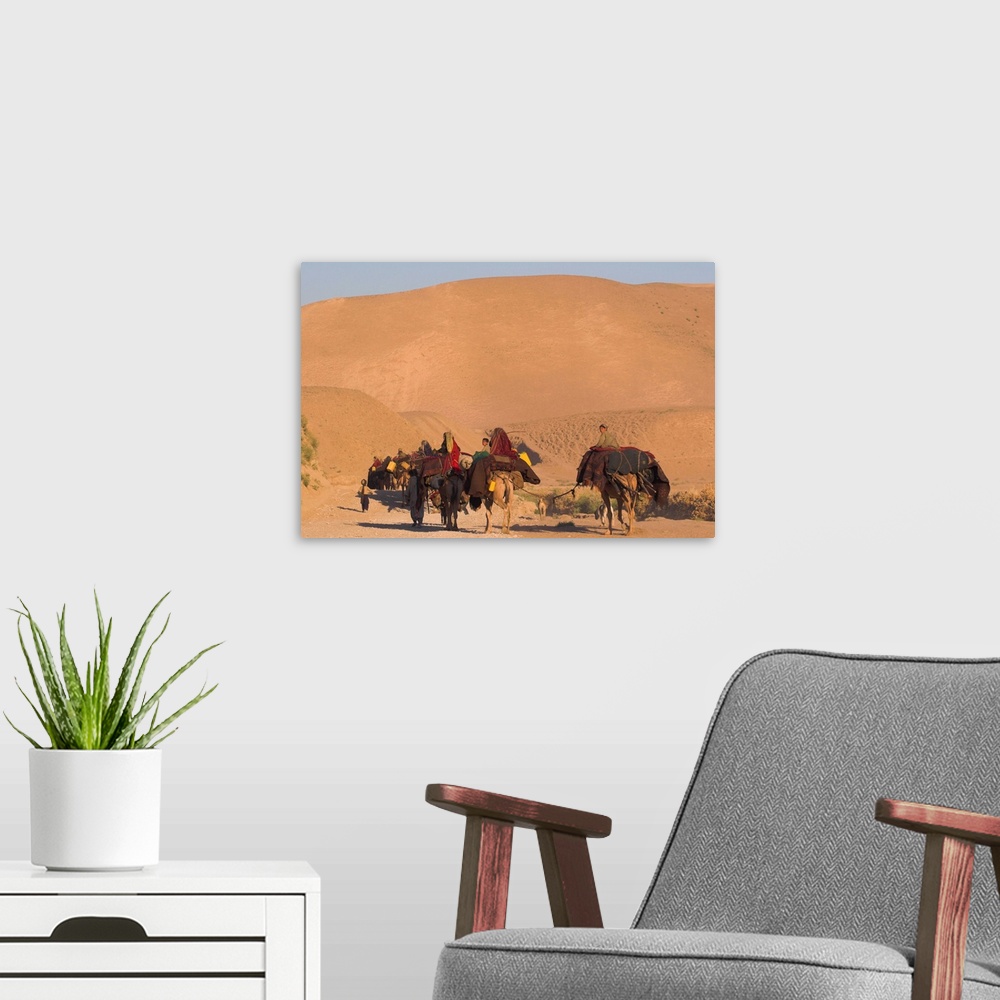 A modern room featuring Kuchie nomad camel train, between Chakhcharan and Jam, Afghanistan, Asia