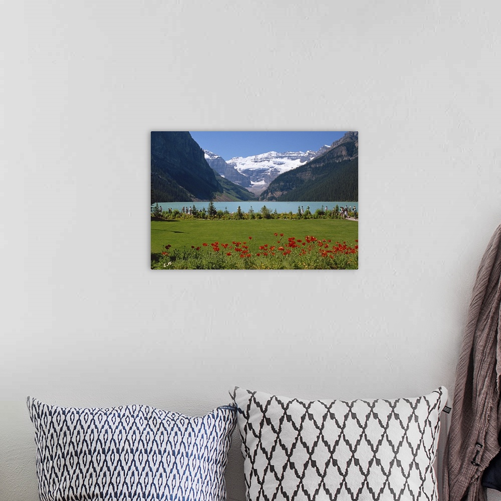 A bohemian room featuring Lake Louise with the Rocky Mountains in the background, in Alberta, Canada