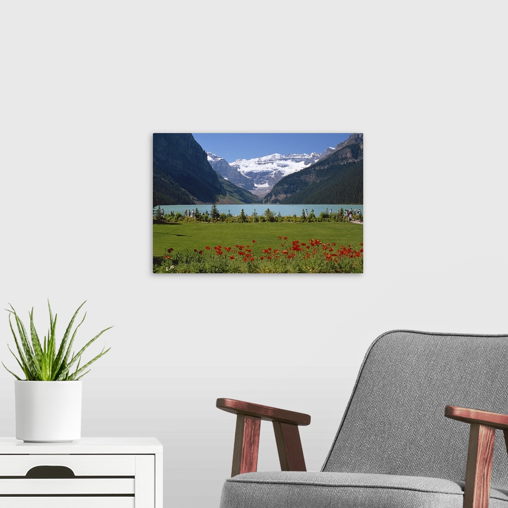 A modern room featuring Lake Louise with the Rocky Mountains in the background, in Alberta, Canada