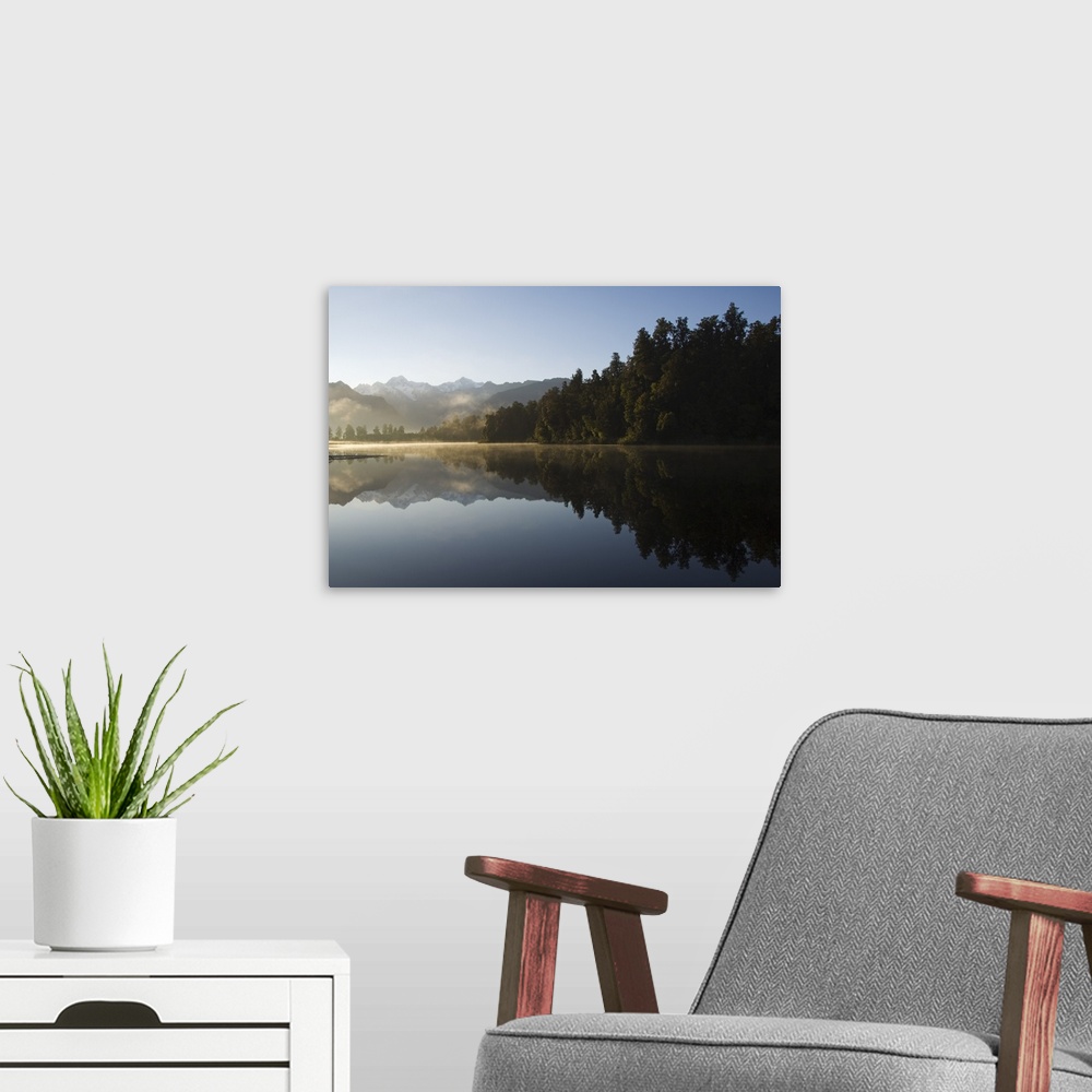 A modern room featuring Lake Matheson reflecting Mount Tasman and Aoraki, South Island New Zealand