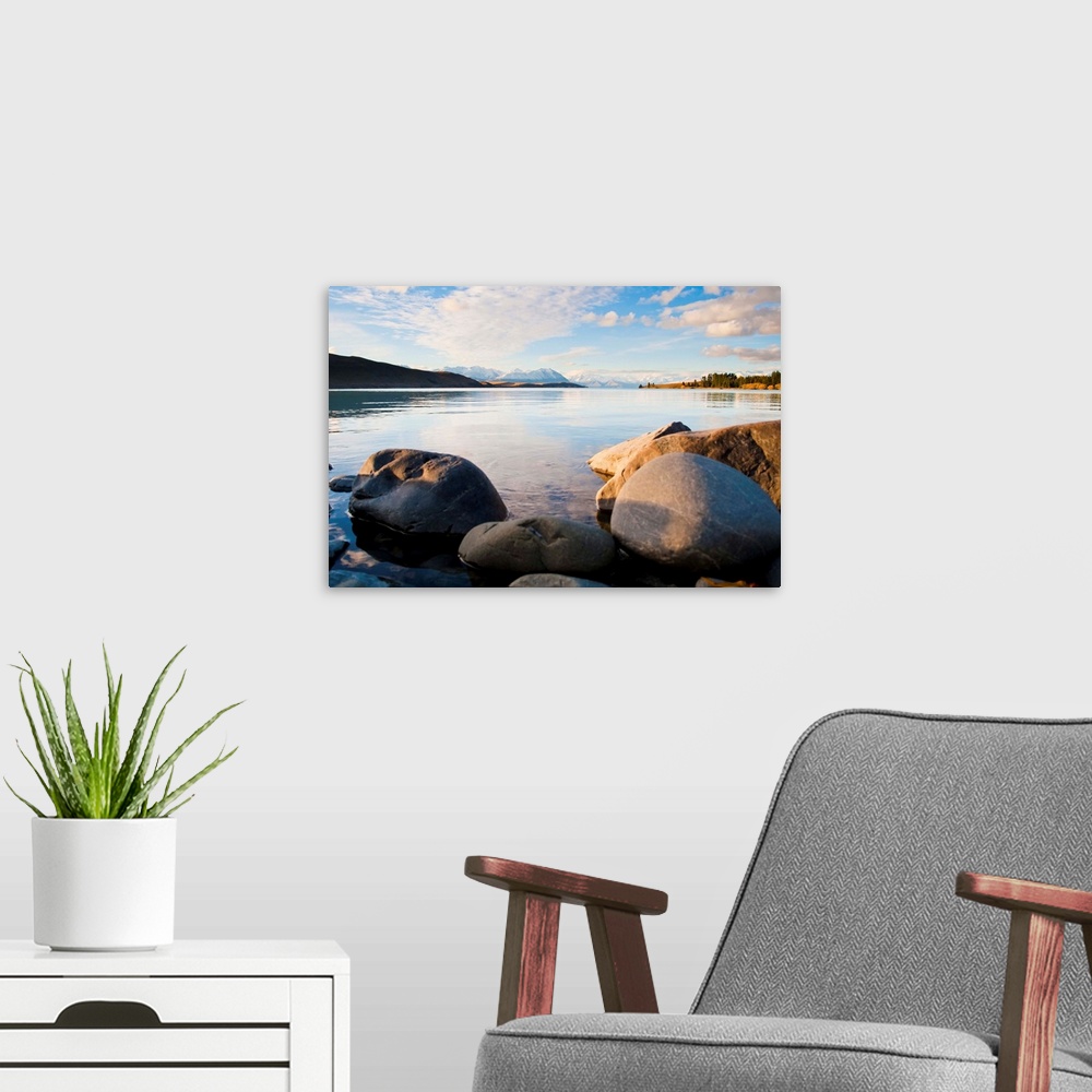 A modern room featuring Lake Tekapo in evening light, Southern Lakes, South Island, New Zealand