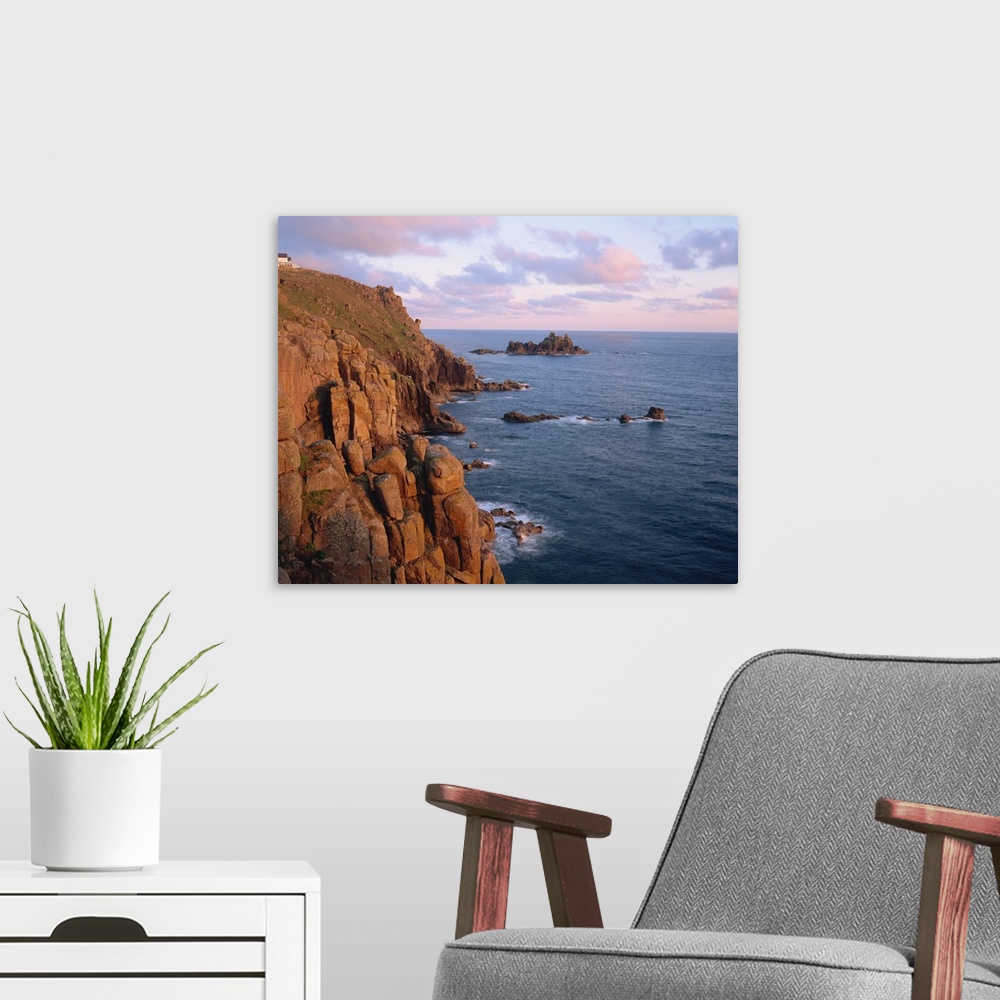 A modern room featuring Lands End at dusk, Cornwall, England