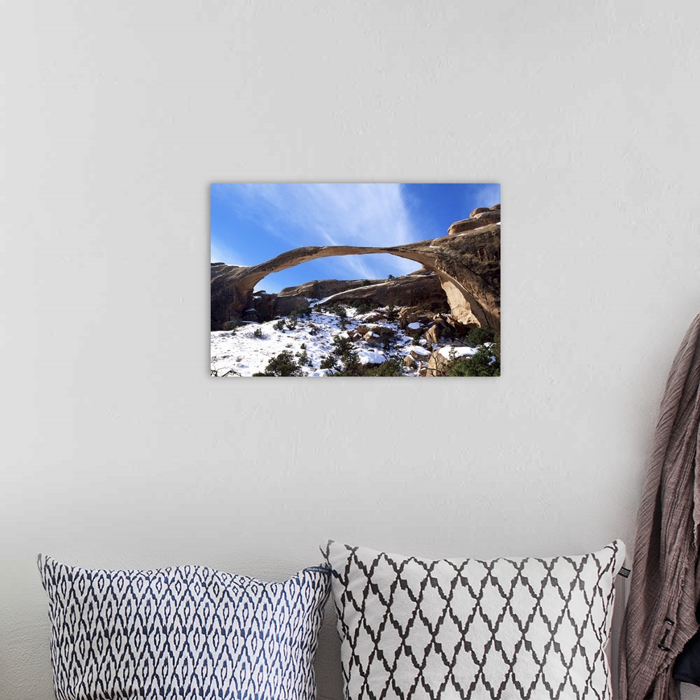 A bohemian room featuring Landscape Arch with snow, Arches National Park, Utah