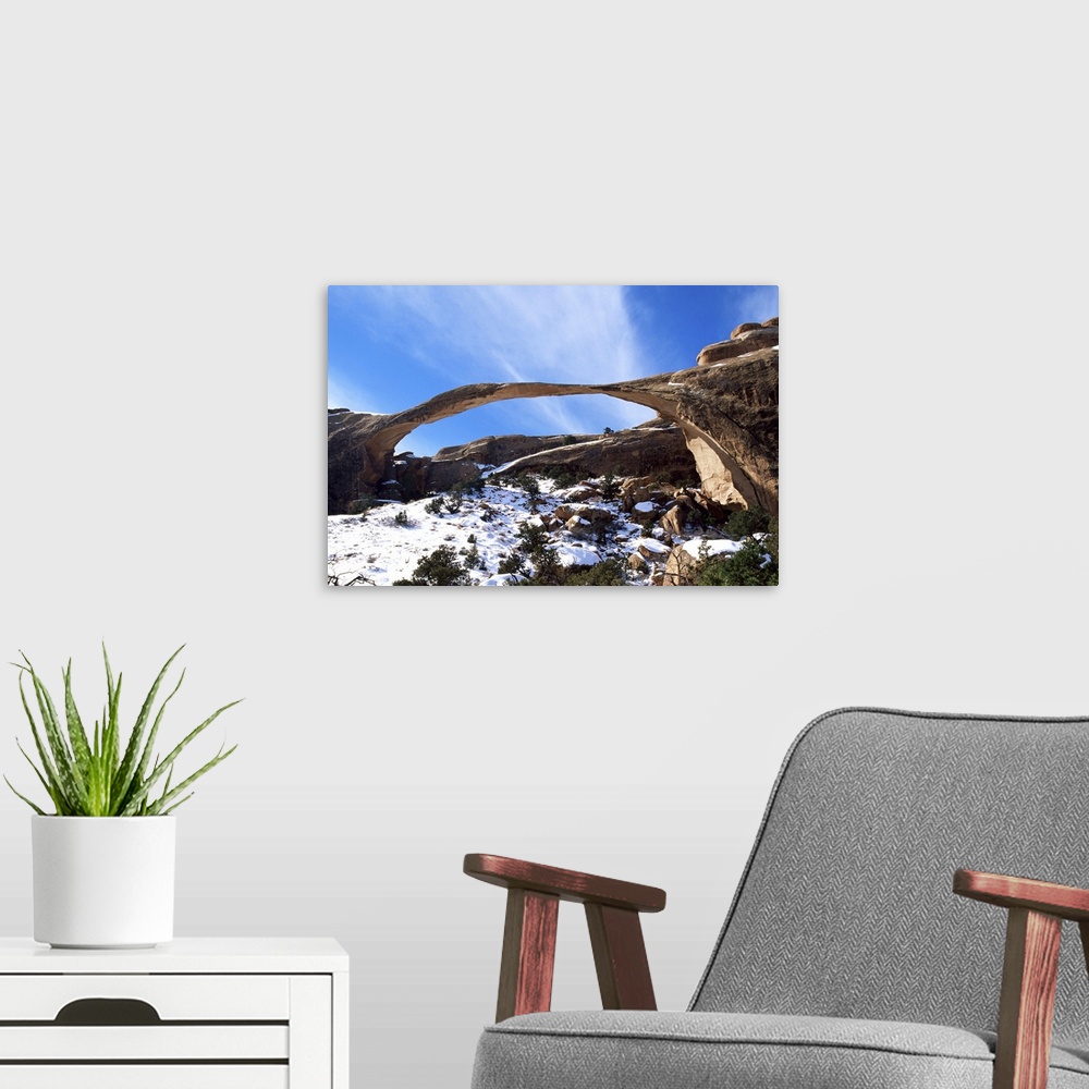 A modern room featuring Landscape Arch with snow, Arches National Park, Utah