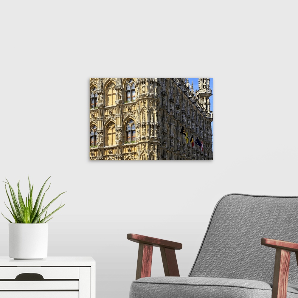 A modern room featuring Late Gothic Town Hall at Grote Markt Square, Leuven, Brabant, Belgium