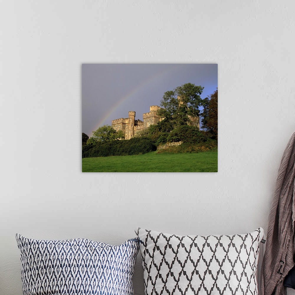 A bohemian room featuring Lews Castle with rainbow, Stornoway, Lewis, Outer Hebrides, Scotland, UK