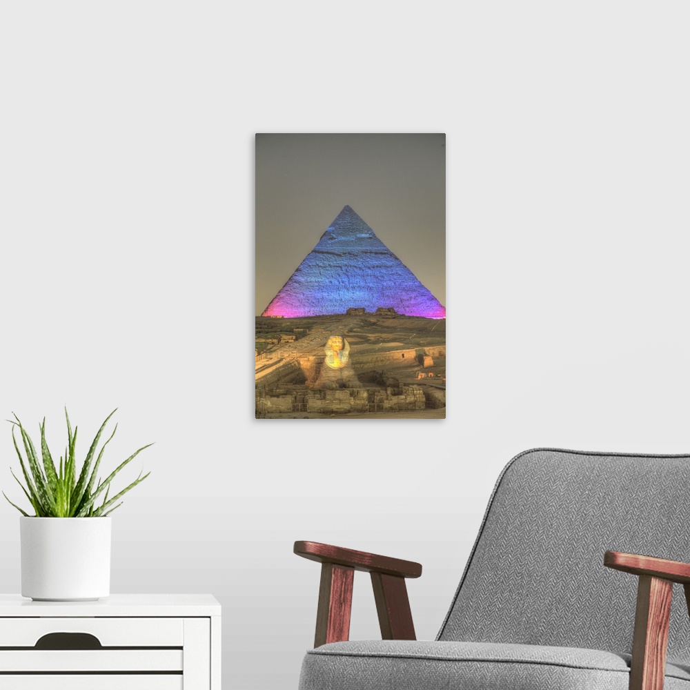 A modern room featuring Light Show, Sphinx, Khafre Pyramid in the background, Great Pyramids of Giza, UNESCO World Herita...