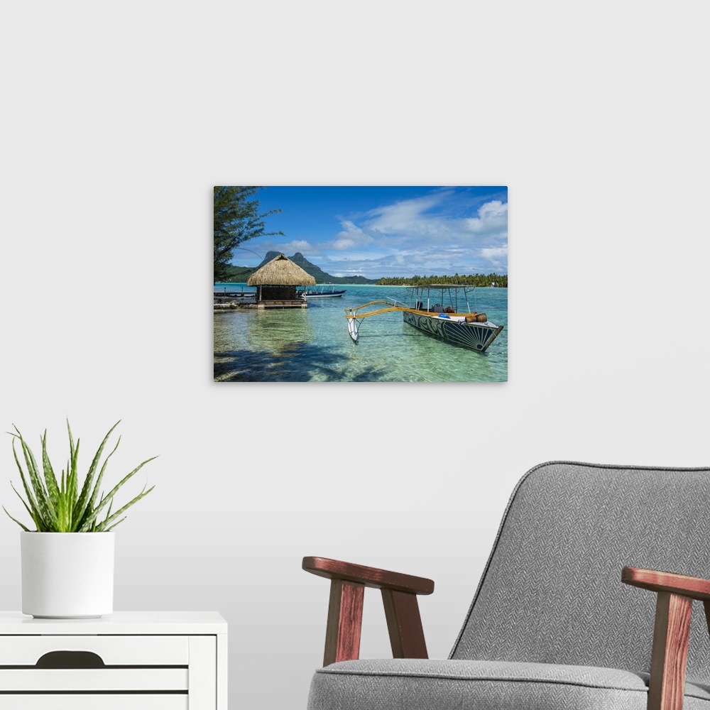 A modern room featuring Little boat anchoring on a small Motu, Bora Bora, Society Islands, French Polynesia