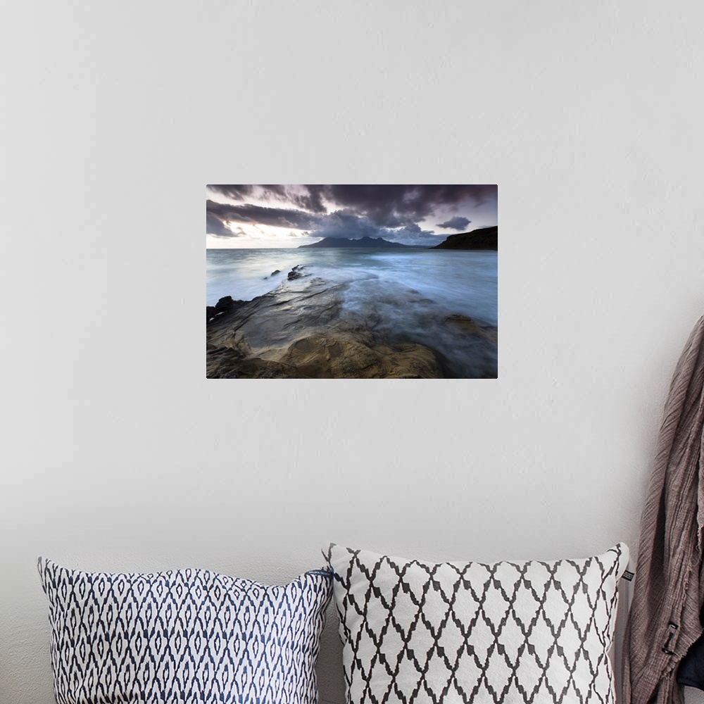 A bohemian room featuring Looking towards Isle of Rum at twilight from rocks at Singing Sands , Isle of Eigg, Scotland