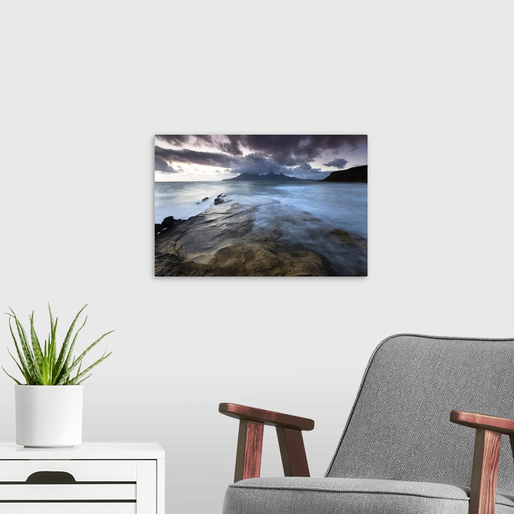 A modern room featuring Looking towards Isle of Rum at twilight from rocks at Singing Sands , Isle of Eigg, Scotland