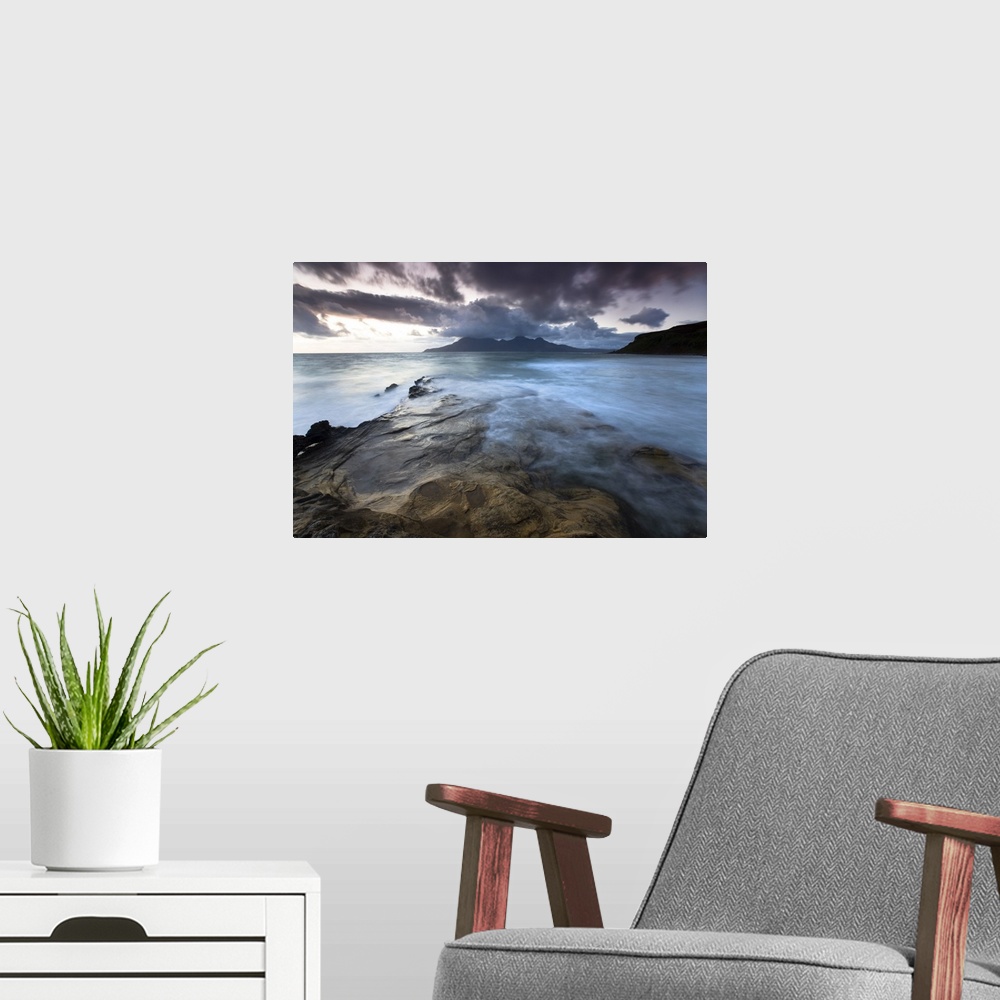 A modern room featuring Looking towards Isle of Rum at twilight from rocks at Singing Sands , Isle of Eigg, Scotland