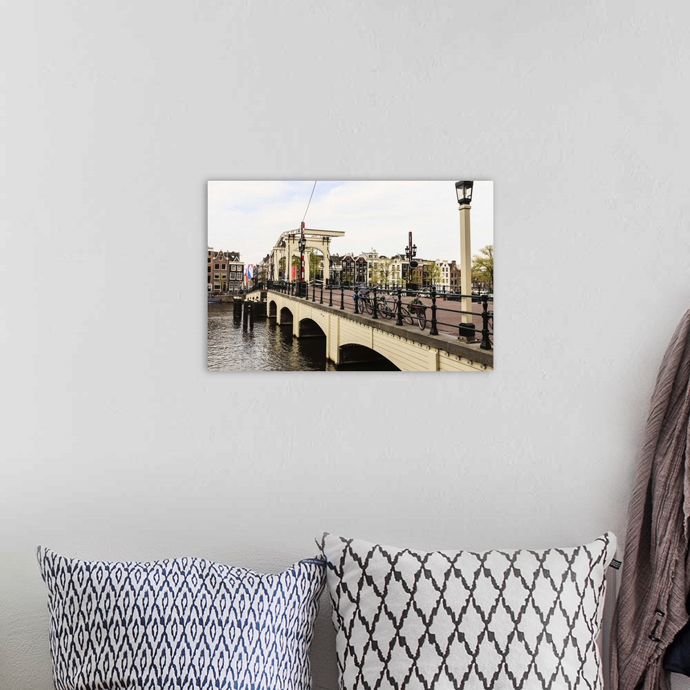 A bohemian room featuring Magere Brug (the Skinny Bridge), Amsterdam, Netherlands, Europe.