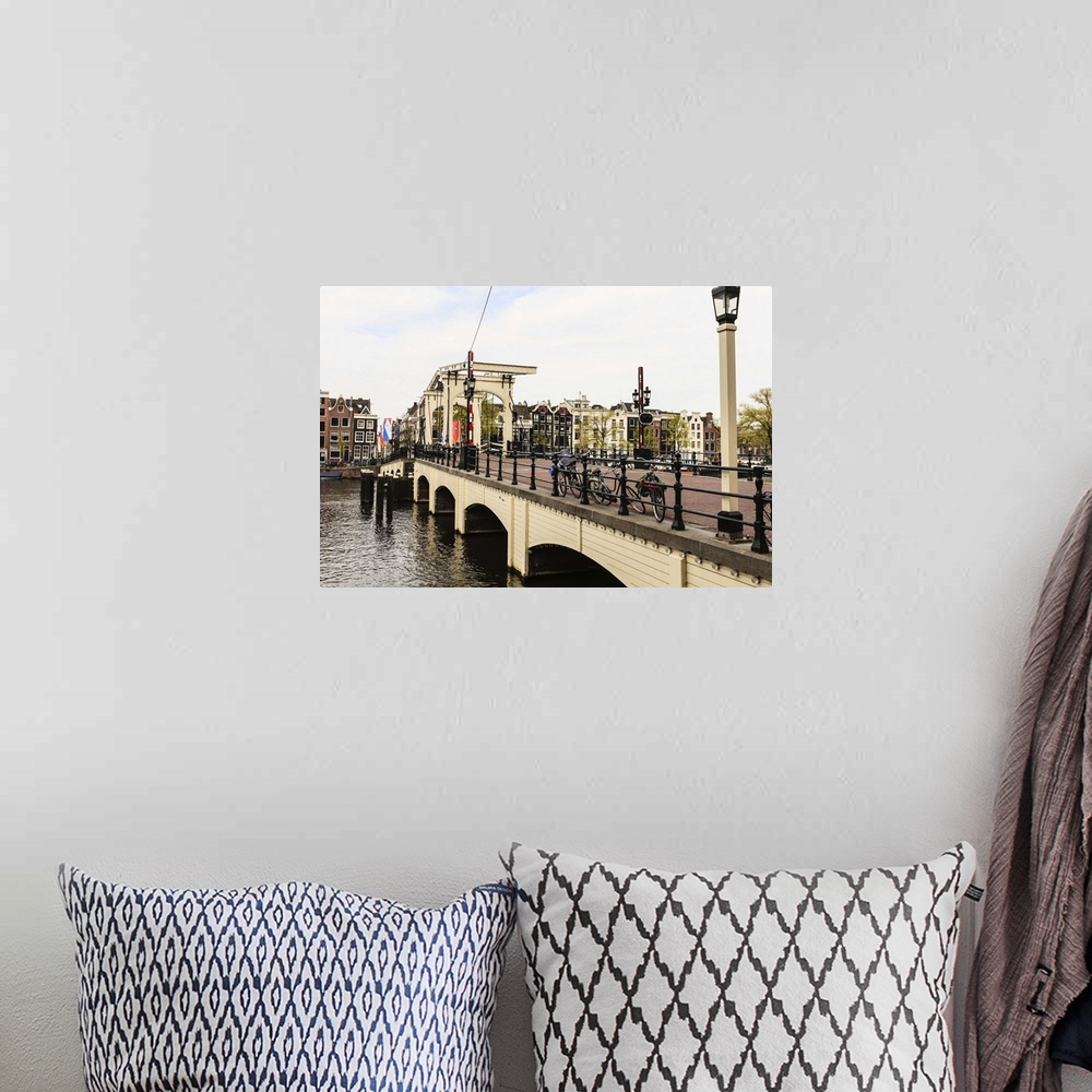 A bohemian room featuring Magere Brug (the Skinny Bridge), Amsterdam, Netherlands, Europe.