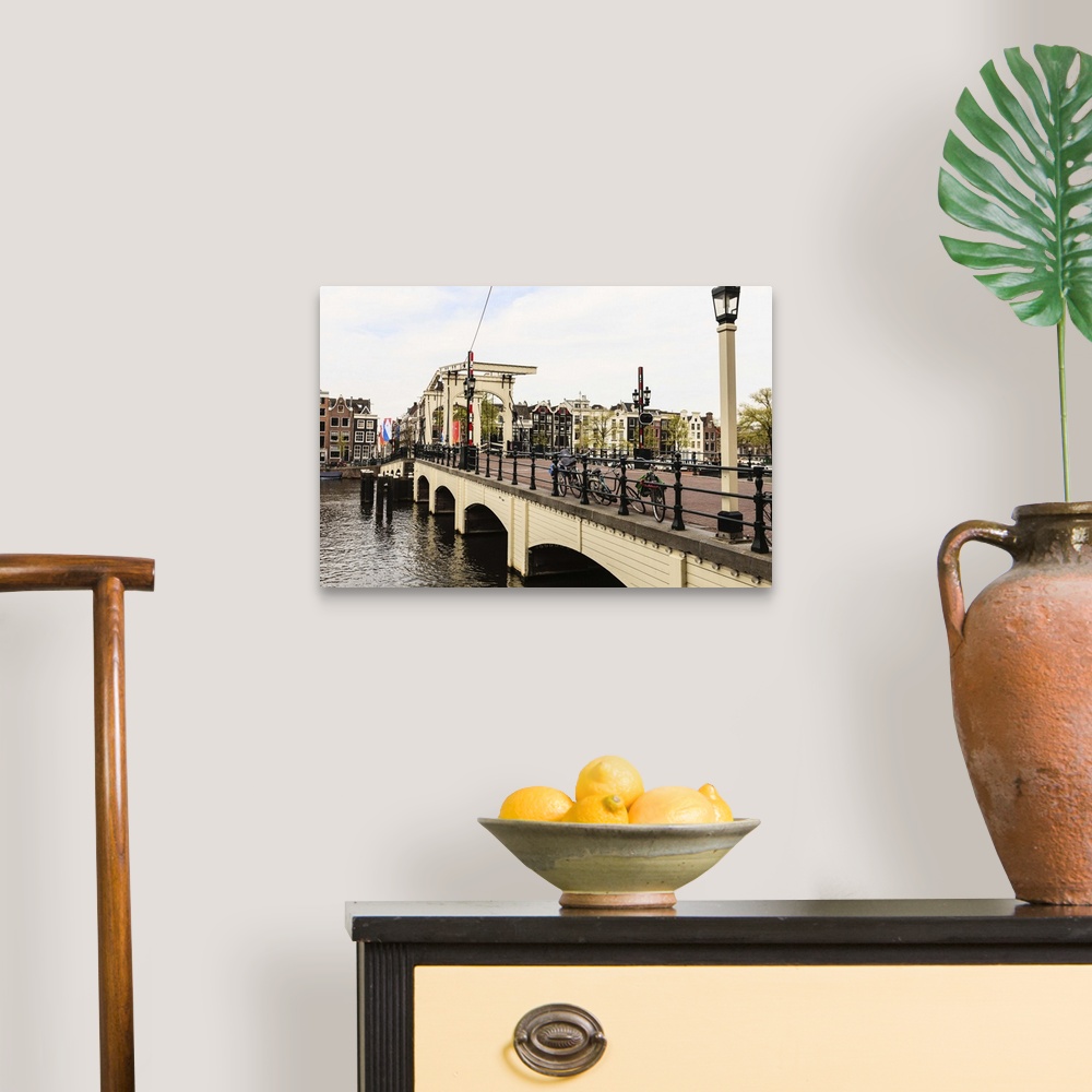 A traditional room featuring Magere Brug (the Skinny Bridge), Amsterdam, Netherlands, Europe.