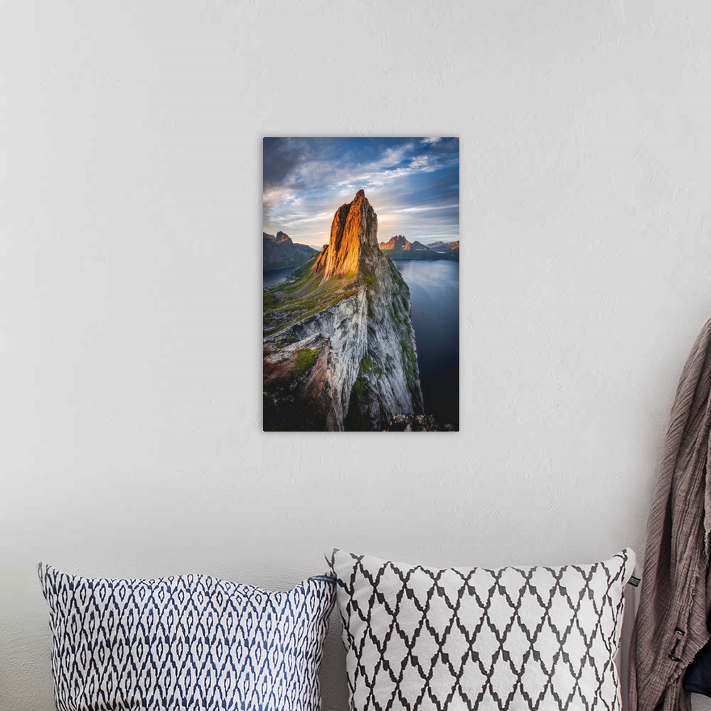 A bohemian room featuring Majestic Mount Segla and fjords under a cloudy sky at sunrise, Senja island,Troms county, Norway,...
