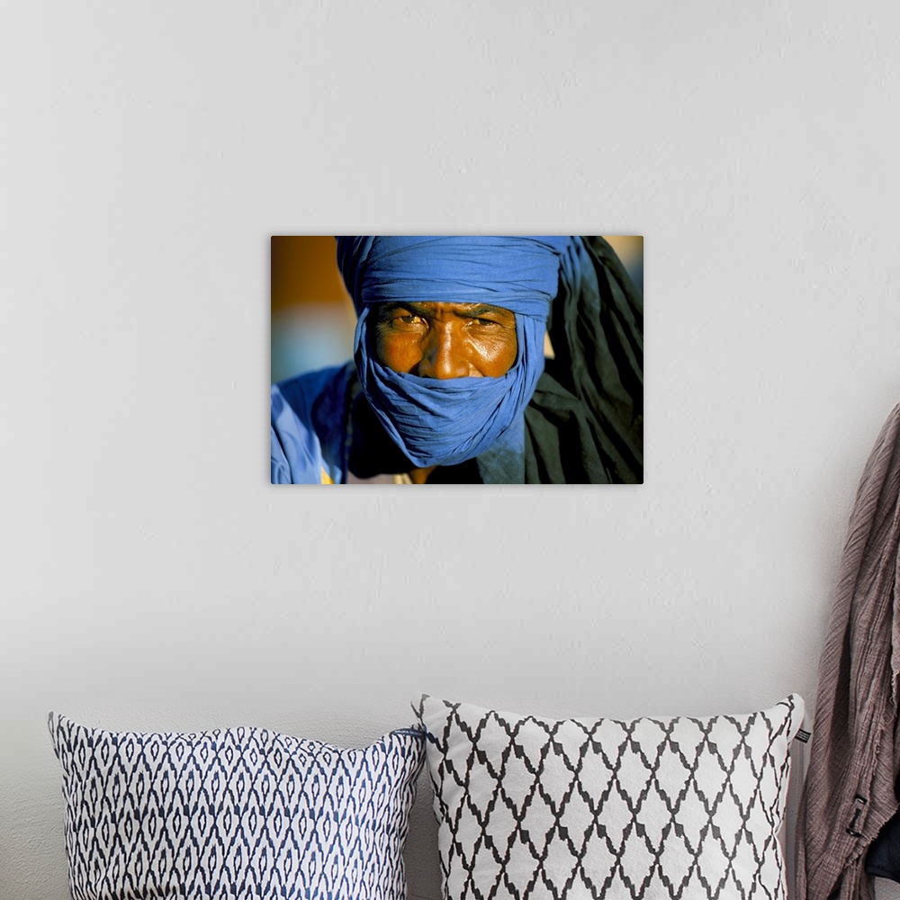 A bohemian room featuring Man wearing blue headscarf, Djemma el Fna, Marrakech (Marrakesh), Morocco, North Africa, Africa