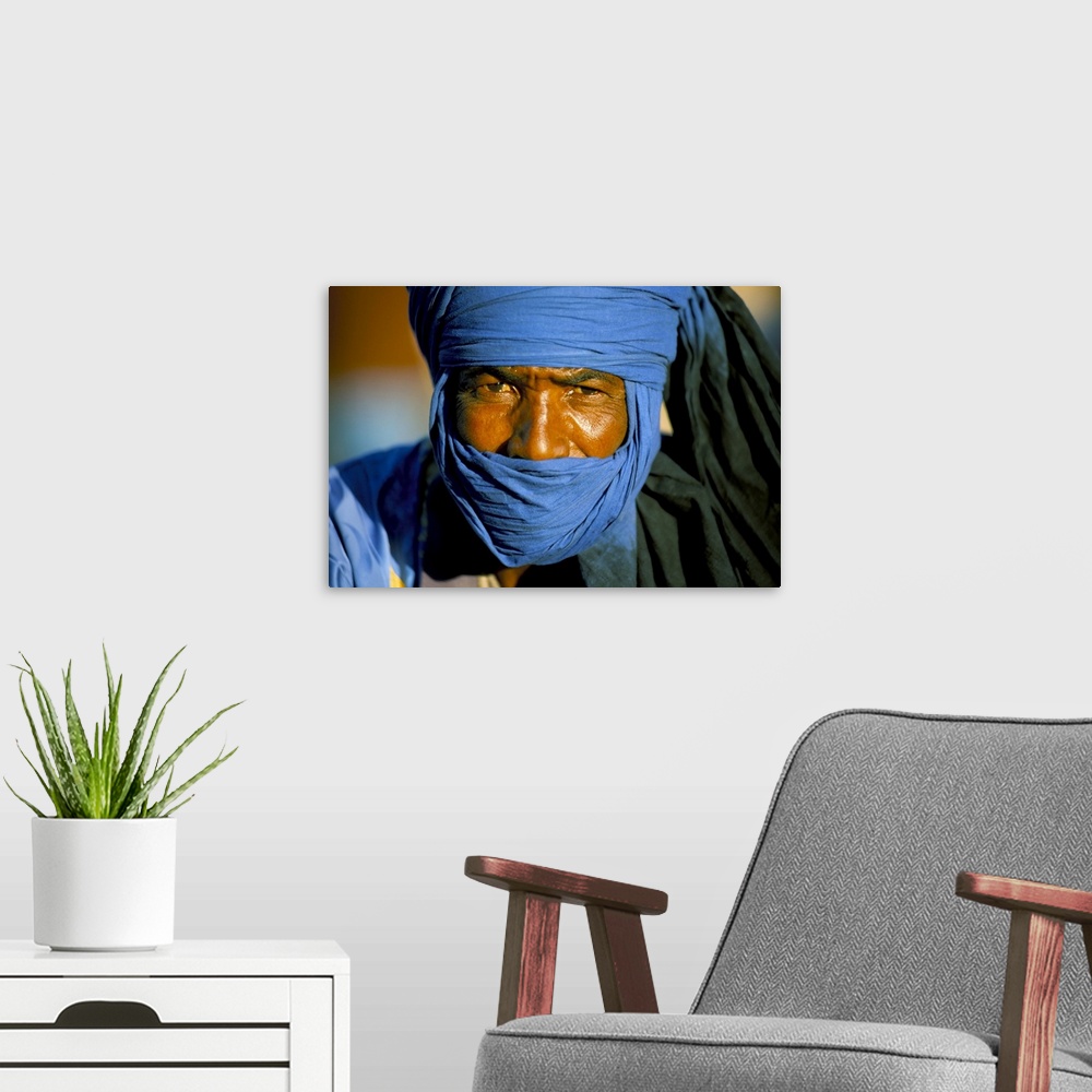 A modern room featuring Man wearing blue headscarf, Djemma el Fna, Marrakech (Marrakesh), Morocco, North Africa, Africa