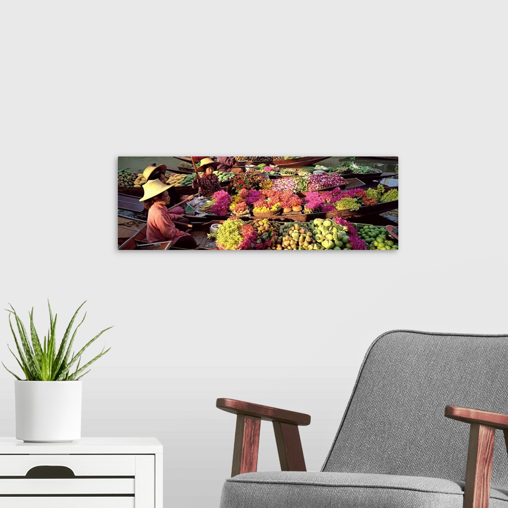 A modern room featuring Market traders in boats laden with fruit and flowers, Bangkok, Thailand
