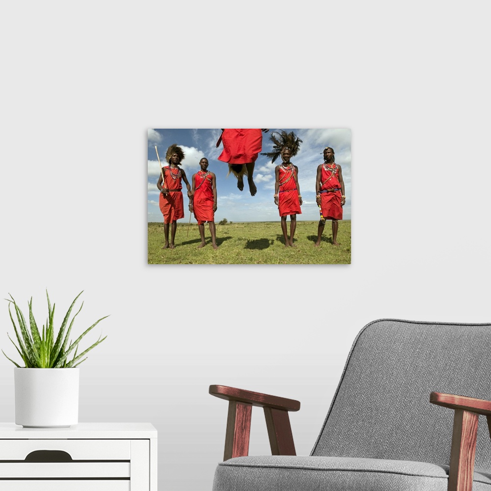 A modern room featuring Masai performing warrior dance, Masai Mara, Kenya, East Africa, Africa