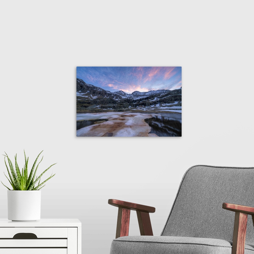 A modern room featuring Melting ice during thaw at dawn, Alpe Fora, Valmalenco, Sondrio province, Valtellina, Lombardy, I...
