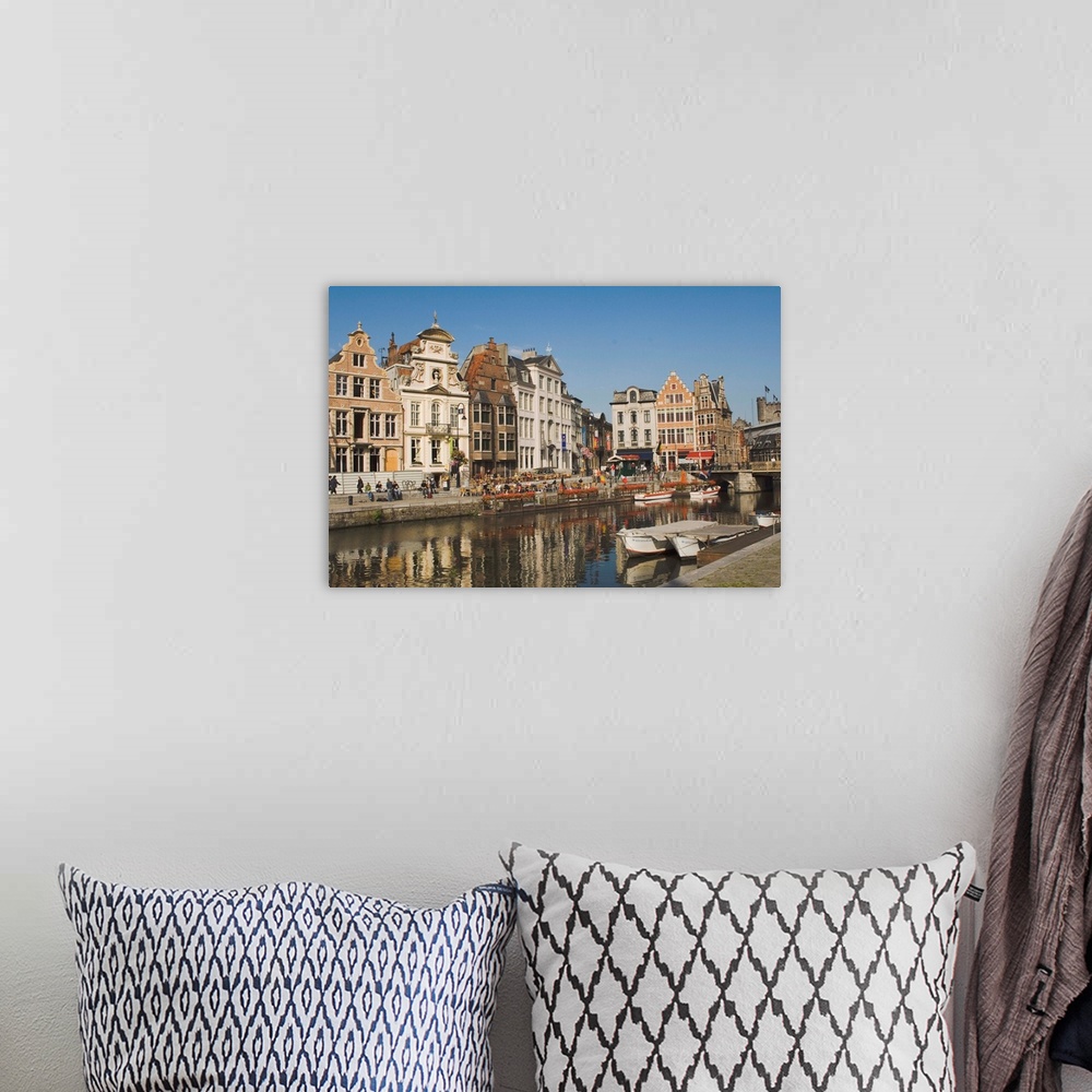 A bohemian room featuring Merchants' premises with traditional gables, by the river, Ghent, Belgium