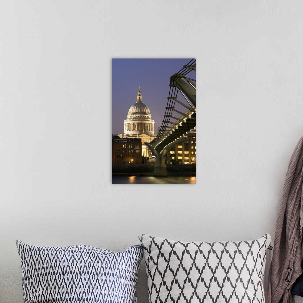 A bohemian room featuring Millennium Bridge and St. Pauls Cathedral, illuminated at dusk, London, England