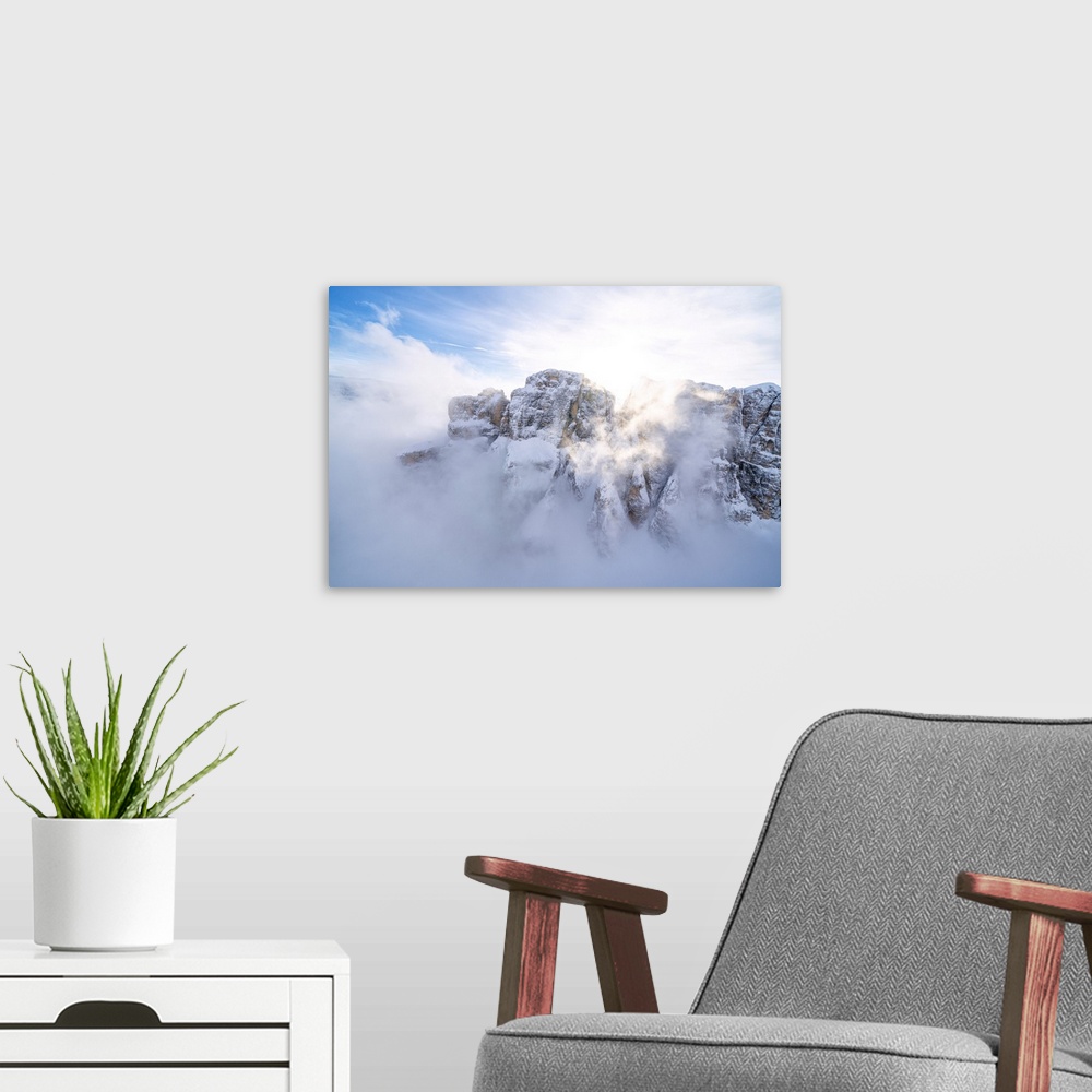 A modern room featuring Mist over the snowy peaks of Sella Group, Dolomites, South Tyrol, Italy, Europe
