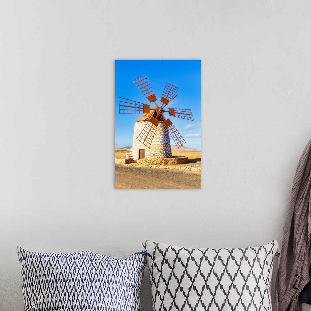 A bohemian room featuring Molino de Tefia, traditional windmill in Tefia, Fuerteventura, Canary Islands, Spain, Atlantic, E...
