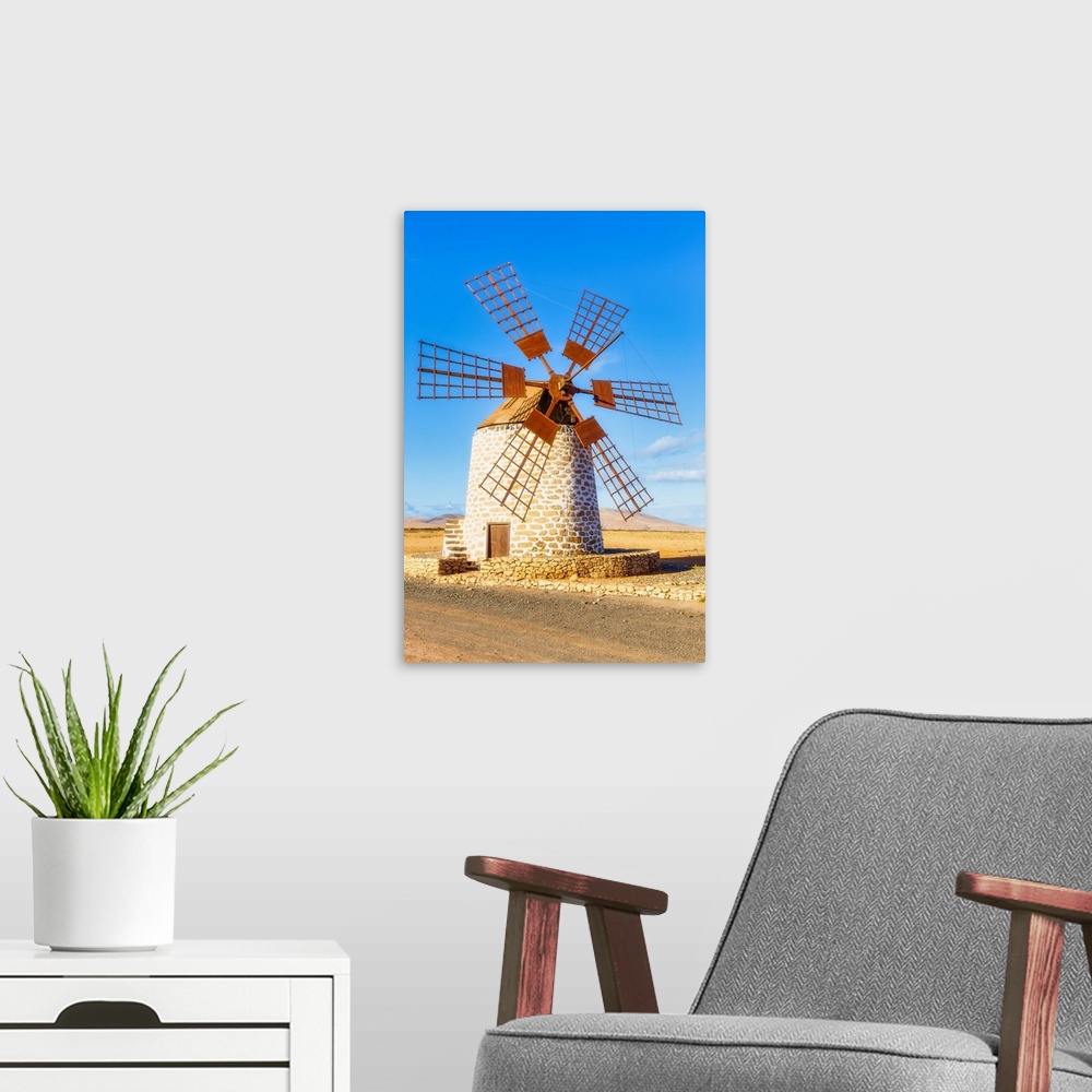 A modern room featuring Molino de Tefia, traditional windmill in Tefia, Fuerteventura, Canary Islands, Spain, Atlantic, E...