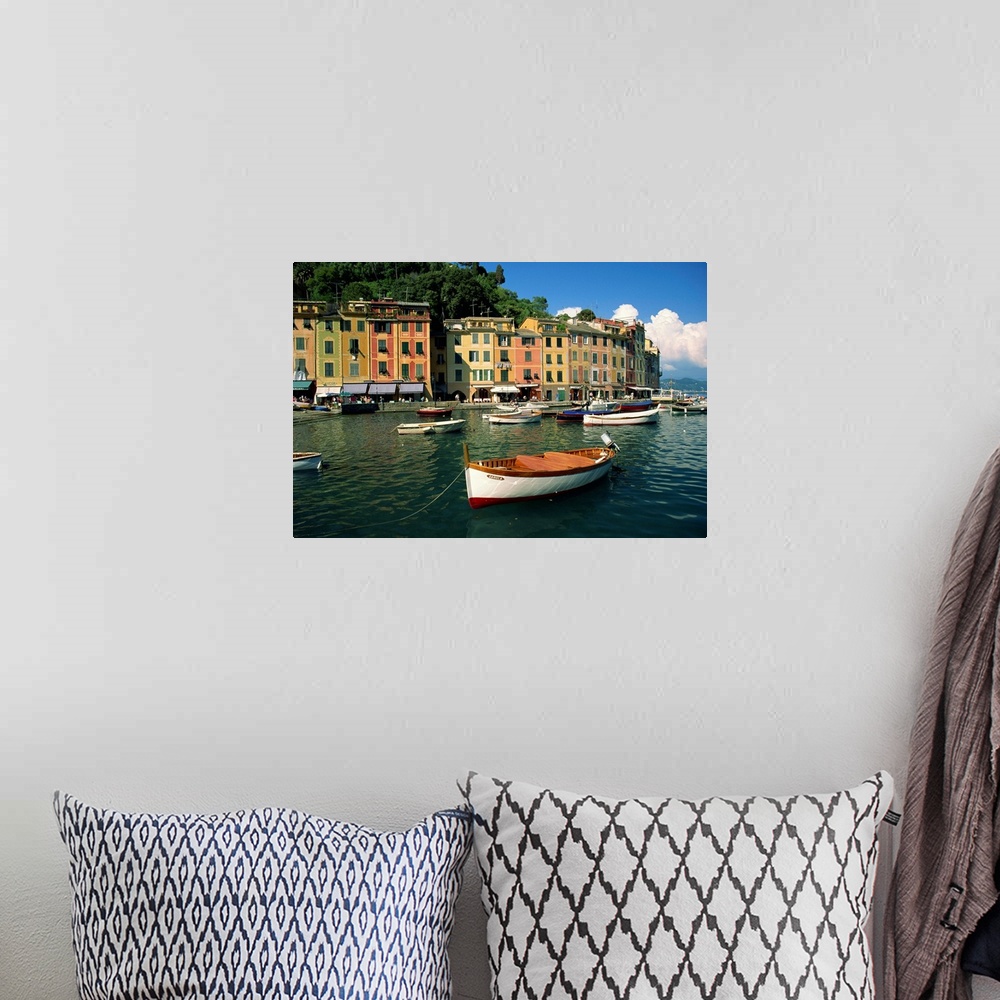 A bohemian room featuring Moored boats and architecture of Portofino, Liguria, Italy, Mediterranean