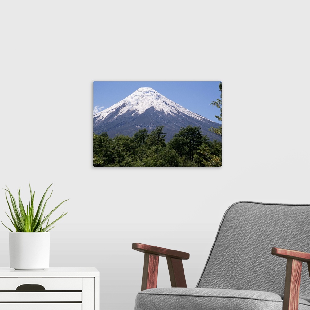 A modern room featuring Mount Osorno, a volcano in Vicente Rosales National Park, Lake District, Chile