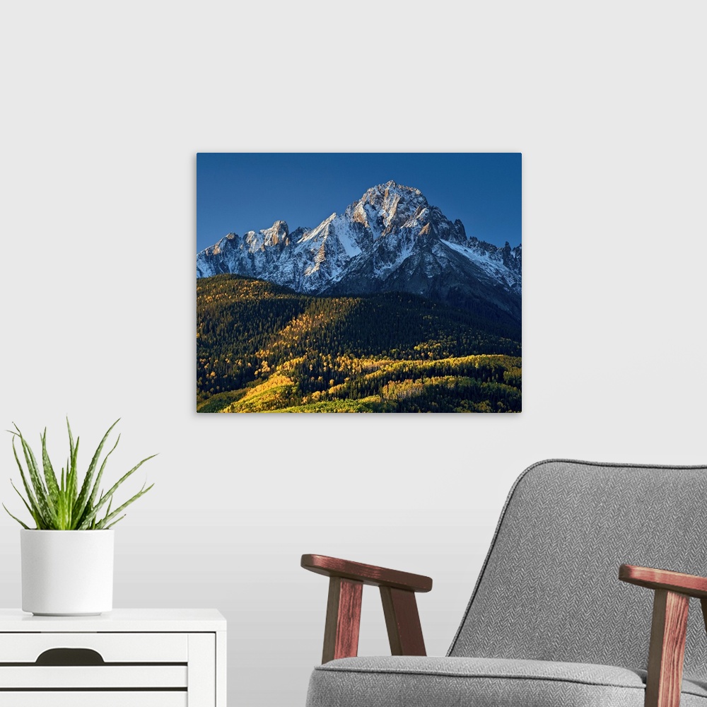 A modern room featuring Mount Sneffels with snow in the fall, Uncompahgre National Forest, Colorado, USA