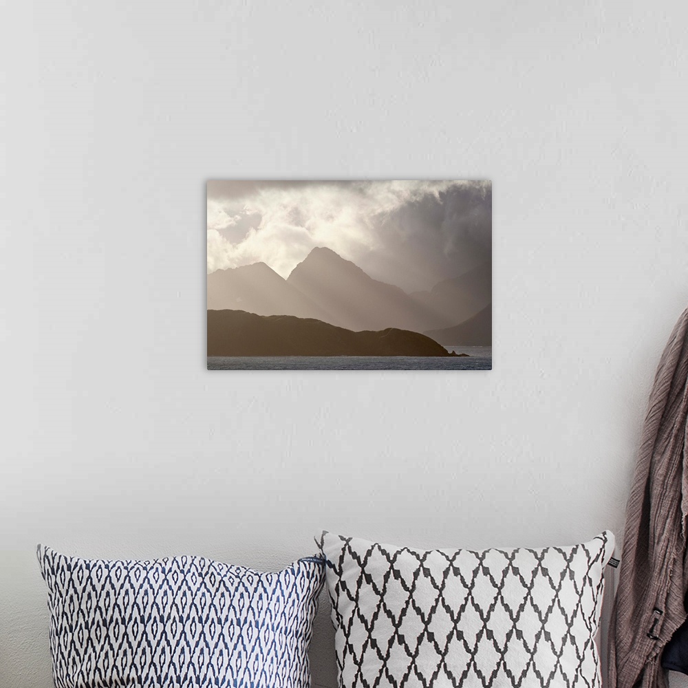 A bohemian room featuring Mountains and clouds on the coast of South Georgia